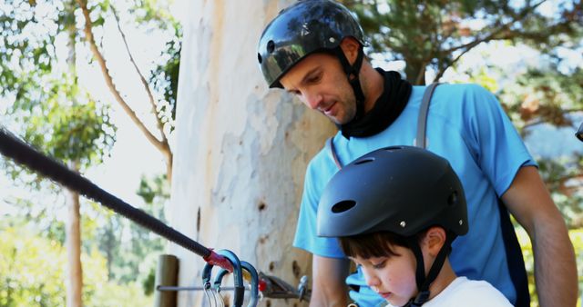 Instructor Guiding Child in Outdoor Adventure Park - Download Free Stock Images Pikwizard.com