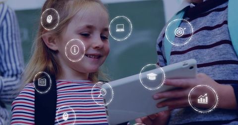 Elementary students using tablet with AR education icons for classroom digital learning