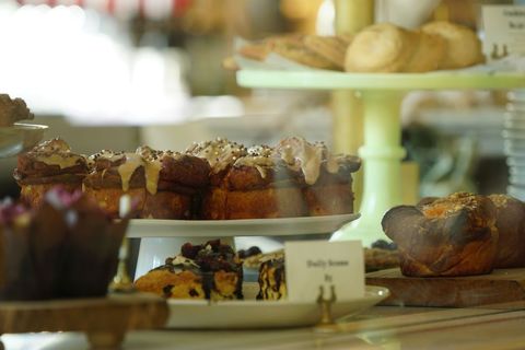 Assorted fresh pastries on display in bakery