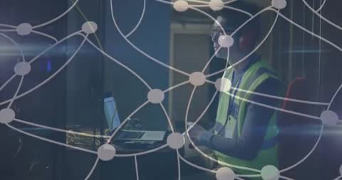 IT Technician Working in Dimly Lit Data Center with Network Visualization