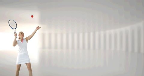 Focused Female Tennis Player Serving with Precision