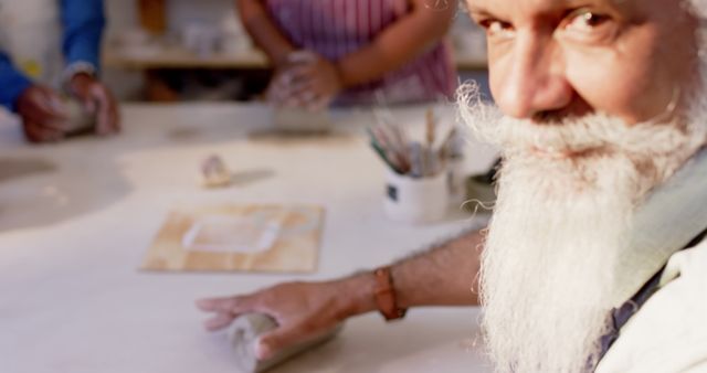 Elderly Artisan Crafting Pottery in Workshop - Download Free Stock Images Pikwizard.com