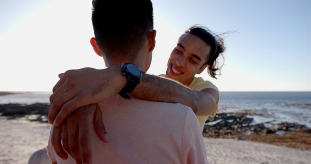 Happy Couple Embracing at Beach with Ocean Background - Download Free Stock Images Pikwizard.com