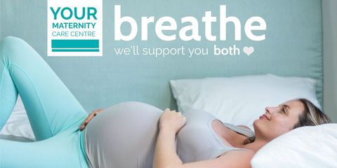 Serene pregnant woman practicing breathing for prenatal health