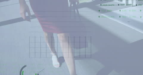 Businesswoman Walking with Digital Data Overlay Background