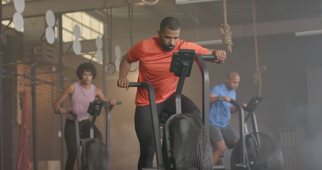 Focused Group Cycling Workout in Industrial Gym - Download Free Stock Images Pikwizard.com