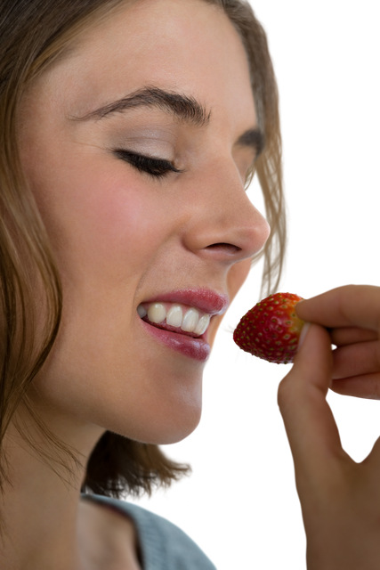 Close-up Transparent Display of Woman Eating Strawberry - Download Free Stock Videos Pikwizard.com