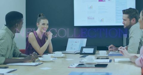 Business Team Collaborating in Boardroom with Modern Presentation