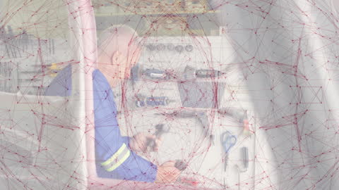 Engineer working in a factory with a digital network overlay suggests technological integration and innovation. Useful for illustrating concepts of modern industry, manufacturing technology, digital transformation in factories, and global connectivity.