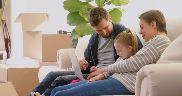 Happy Family Relaxing at Home in Living Room with Laptop - Download Free Stock Images Pikwizard.com