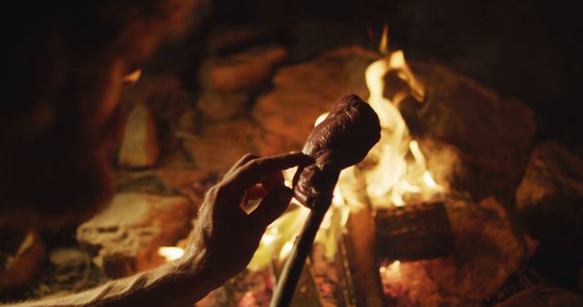 Person Cooking Meat on a Campfire in Wilderness - Download Free Stock Images Pikwizard.com