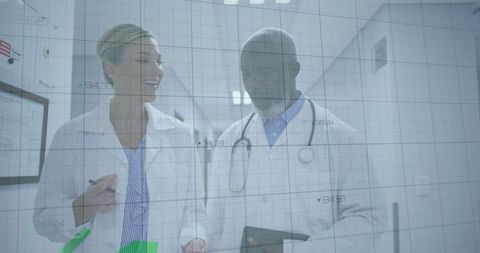 Doctors Discussing Medical Data in Innovative Hospital Setting