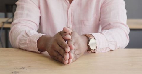 Business Professional Gesturing at Meeting Desk - Download Free Stock Images Pikwizard.com
