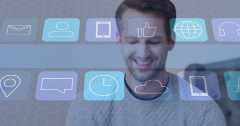 Smiling Colleague Engaging with Floating Digital Icons Overlay - Download Free Stock Images Pikwizard.com