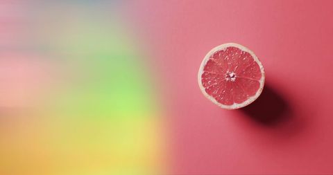 Sliced Grapefruit with Dynamic Colorful Background