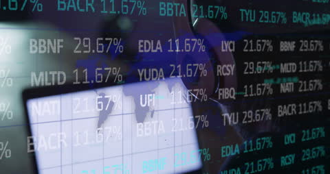 Businessman Analyzing Market Data on Laptop in Office