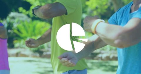 Diverse Group Practicing Outdoor Exercises with Digital Interface