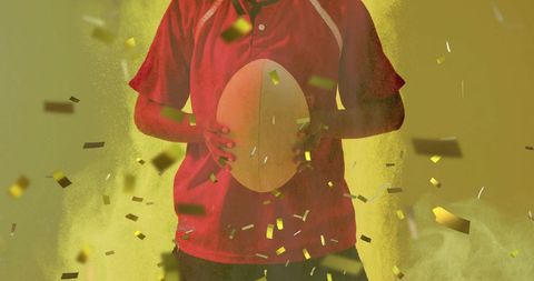 Biracial female rugby player celebrating with confetti