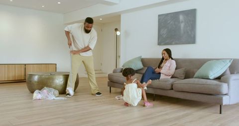 Family Enjoying Quality Time Together with Cleaning Activity