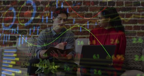 Business Team Analyzing Finance Data with Digital Overlay