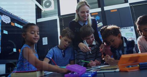 Teacher Engaging with Diverse Students in Modern Classroom - Download Free Stock Images Pikwizard.com