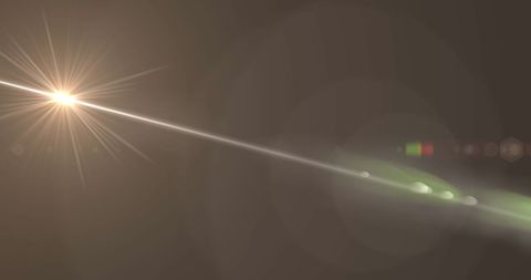 white light beam with lens flare on grey background - Download Free Stock Images Pikwizard.com