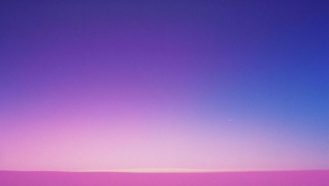 Vibrant Gradient Sky Merging with Serene Pink Horizon