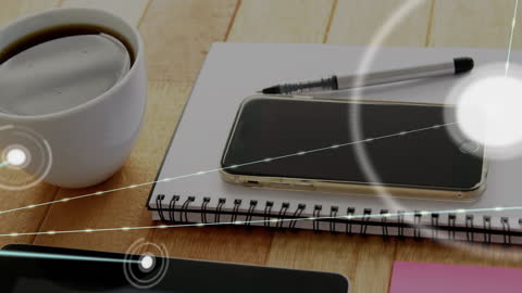 Office Desk with Smartphone and Cup of Coffee and Network Animation Overlay