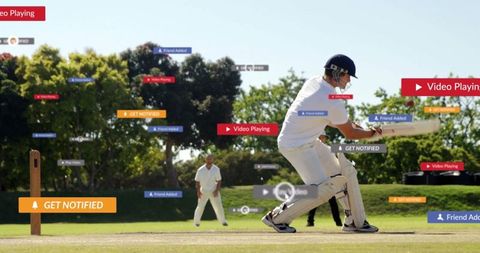 Cricketer swinging bat on pitch with digital overlays background