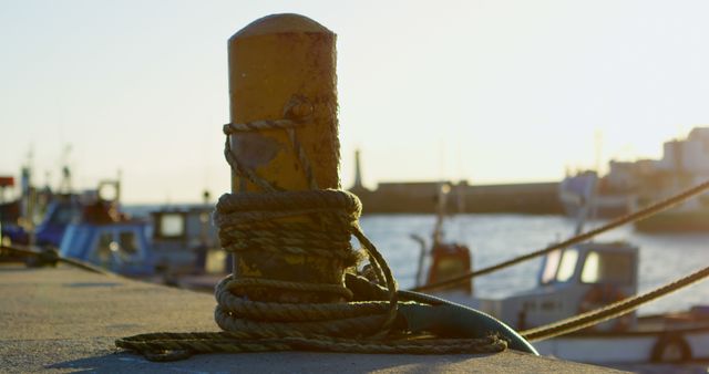 Rope Tied Around Bollard at Sunny Harbor - Download Free Stock Images Pikwizard.com