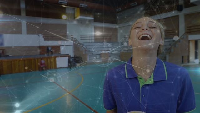 Female volleyball player laughing and enjoying the moment in a sports hall with a digital network overlay. Perfect for concepts related to sports technology, active lifestyles, joy in athletics, and connected fitness applications.