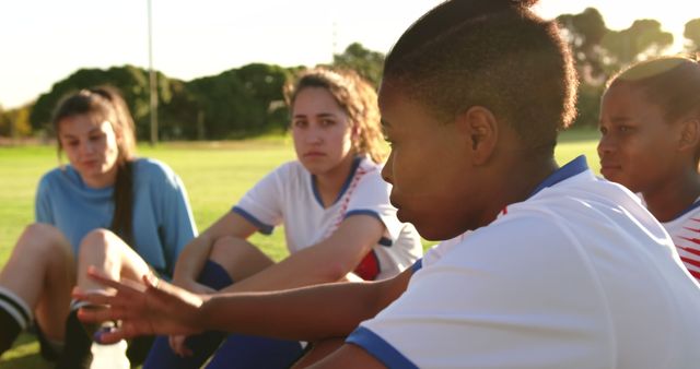 Motivated Female Soccer Team Having Strategy Meeting on Field - Download Free Stock Images Pikwizard.com