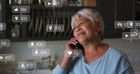 Senior woman engaging with social media notifications