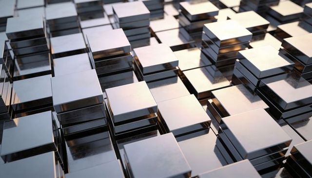 Stacked chrome squares reflecting light in geometric grid with depth and shadow