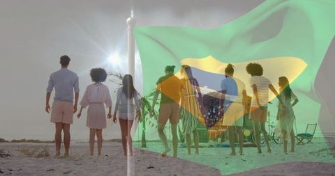 Friends standing on sandy beach facing horizon with brazilian flag double exposure