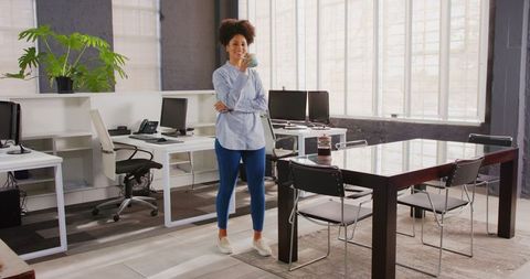 Businesswoman Taking Coffee Break in Modern Office Setting - Download Free Stock Images Pikwizard.com