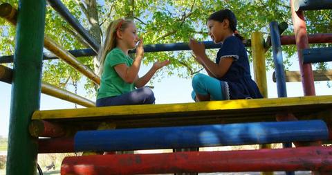 Children Playing Pat-a-Cake Game Outdoors on Playground Equipment - Download Free Stock Images Pikwizard.com