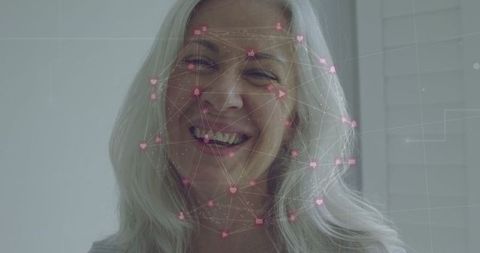 Senior Woman Smiling with Digital Interface Superimposed