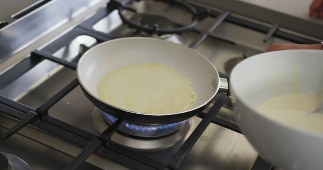 Cooking Pancake Batter on Gas Stove in Kitchen - Download Free Stock Images Pikwizard.com