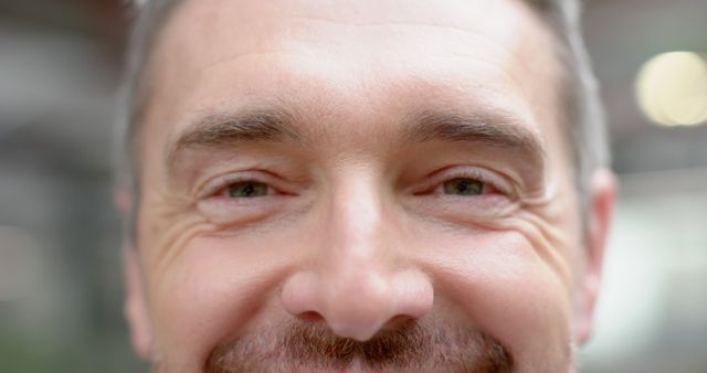 Close-Up of Smiling Middle-Aged Man with Bright Eyes - Download Free Stock Images Pikwizard.com