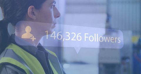Female Engineer with Virtual Follower Count in Industrial Setting