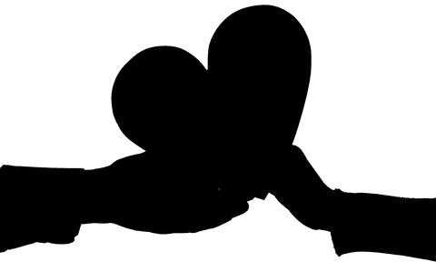Silhouette of hands holding heart on transparent background