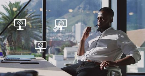 Businessman in Office Handling Global Network Concepts