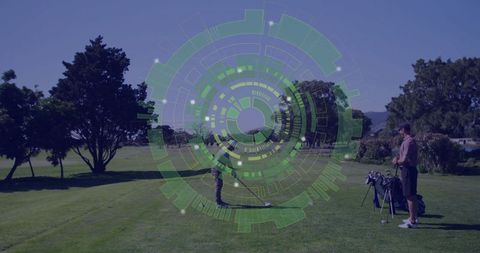 Golfer swinging on tee box with futuristic overlay