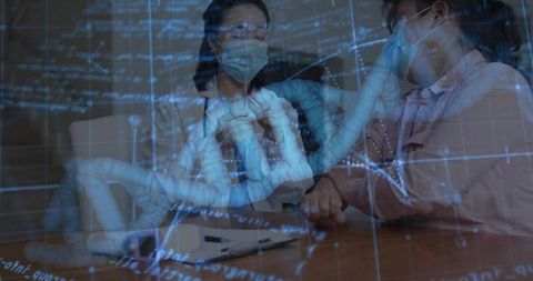 Doctor and patient examining genetic data in medical office
