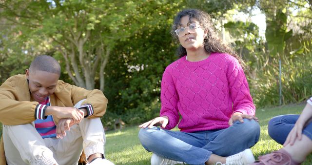 Diverse group relaxing outdoors on sunny day - Download Free Stock Images Pikwizard.com