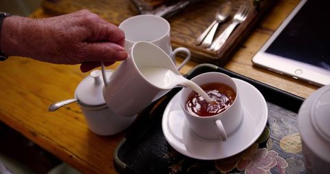Senior Woman Enjoying Tea Time and Relaxation - Download Free Stock Images Pikwizard.com