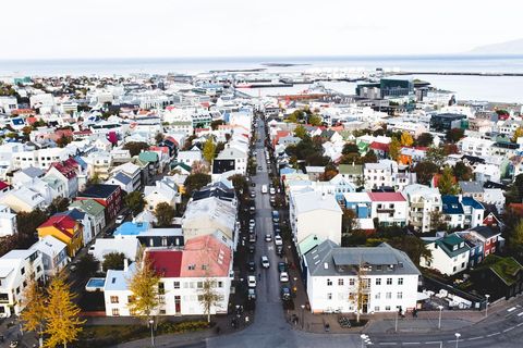 Aerial View of Reykjavik's Colorful Buildings and Ocean Horizon