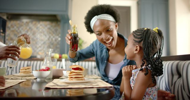 Mother and Daughter Enjoying Breakfast Together - Download Free Stock Images Pikwizard.com