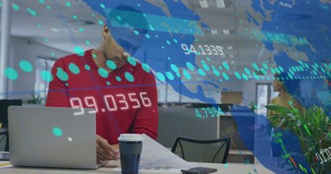 Businessman Engaged in Global Data Analysis in Modern Office